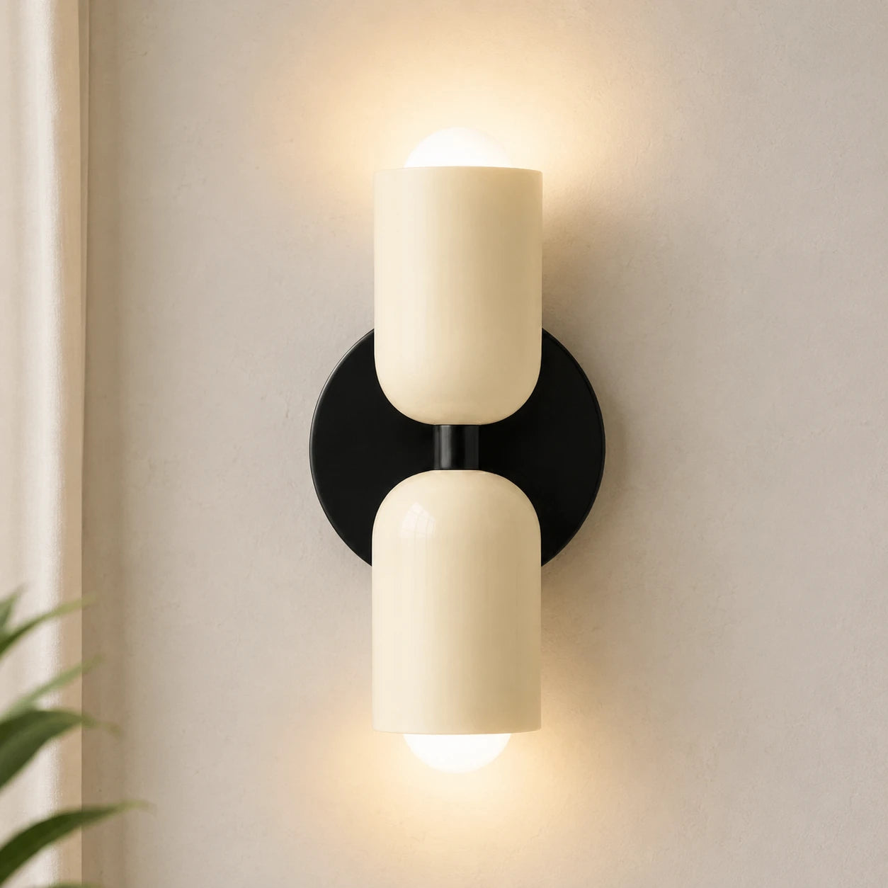 Two-tone Nordic indoor wall light — cream and black cylindrical shades.