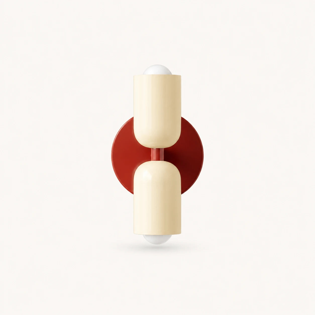 Two-tone Nordic indoor wall light — cream shades on a red backplate for a warm Scandinavian accent colour.
