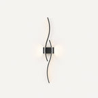 Wave LED modern wall light in black 60cm mounted vertically — portrait orientation for tall narrow wall spaces.