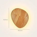 Wooden backlit LED Japandi wall light — oval large portrait format for taller walls and bedroom headboard placement.