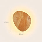 Wooden backlit LED Japandi wall light — oval small, a slim portrait silhouette ideal for narrow bedroom walls.