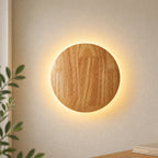 Wooden backlit LED Japandi wall light — round shape.